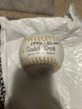 Worth White Baseball with Gold Stitching and Logo